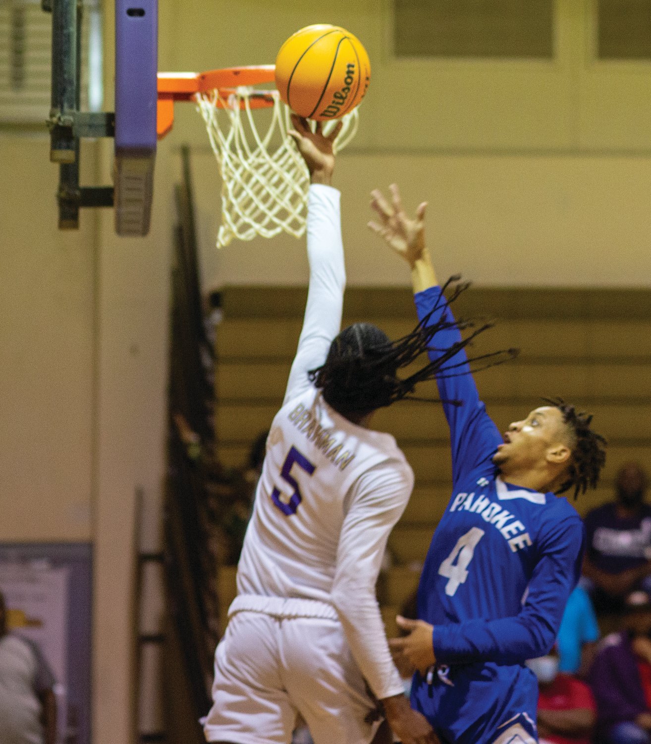 OHS senior Amayoa'ah Phillips attempts a layup over a Pahokee defender.